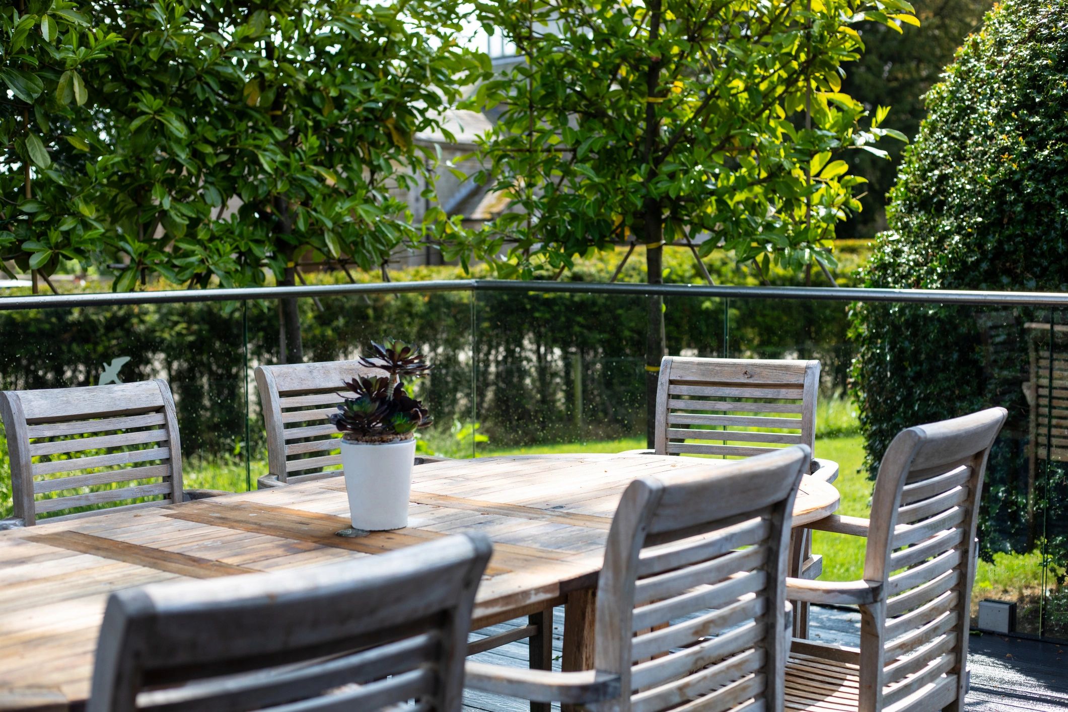 Backyard deck setting to illustrate a protected, stained outdoor living space
